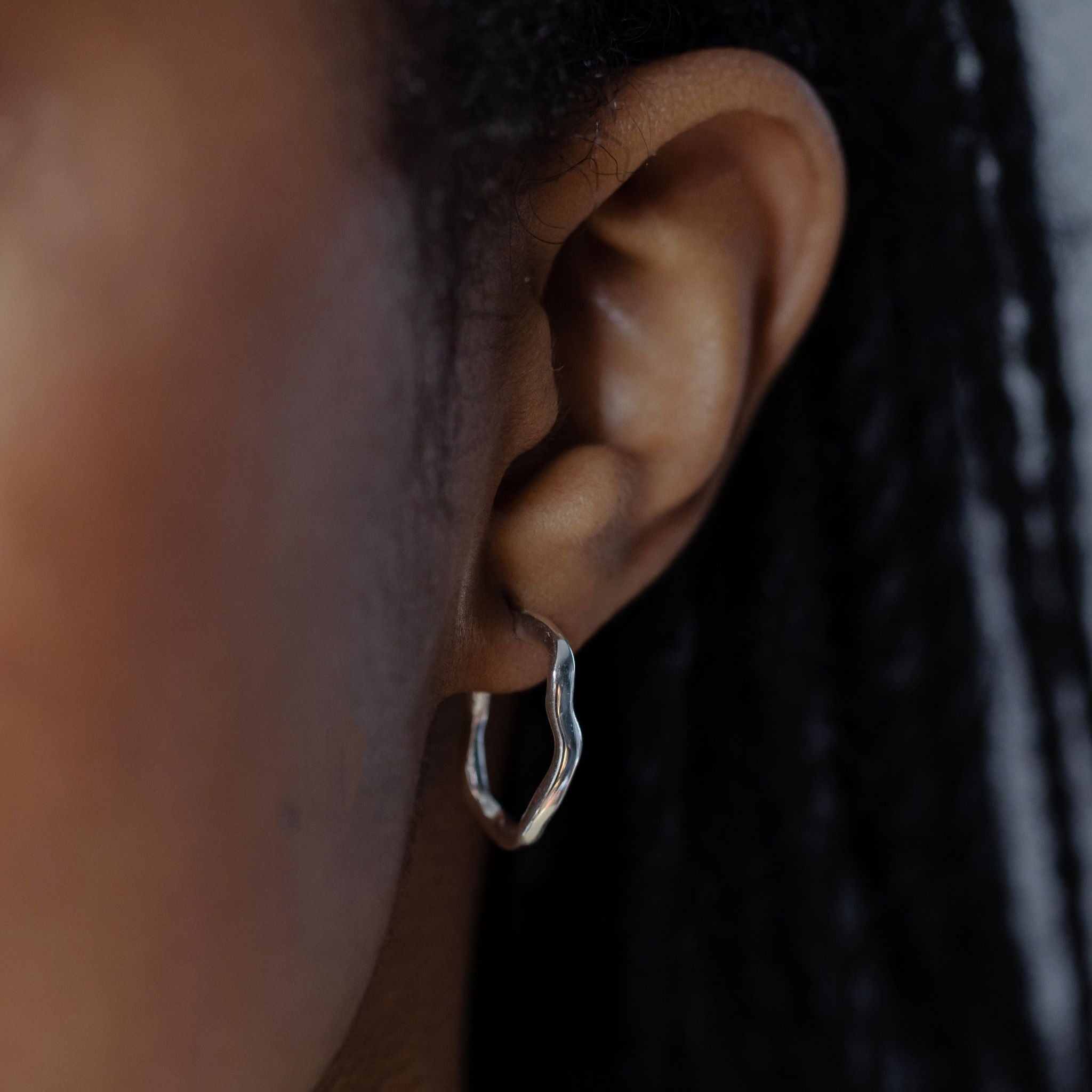 Earrings features a handcut natural ripple shape and is crafted from sterling silver or 18ct gold vermeil.