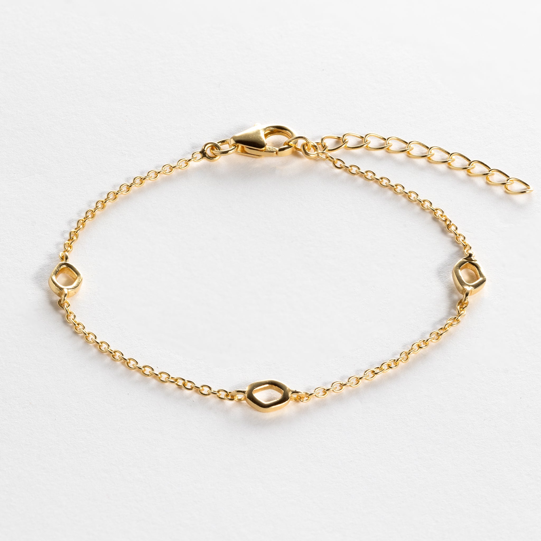 Bracelet features small dapple shapes and is crafted from sterling silver or 18ct gold vermeil.