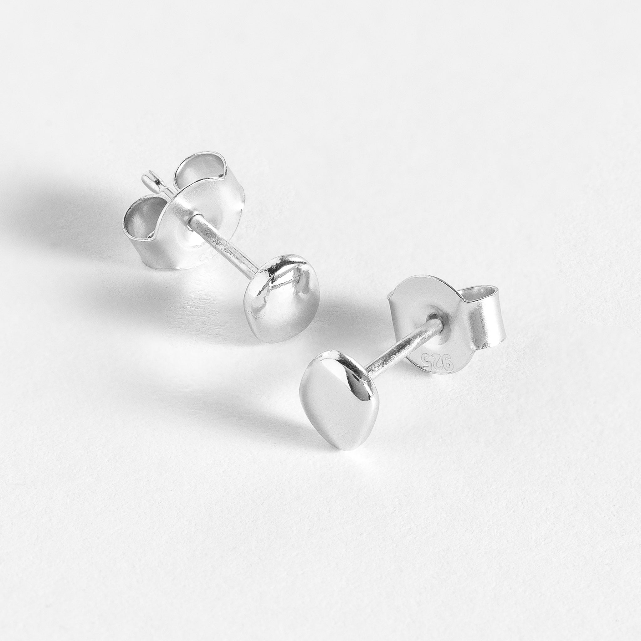 Stud features a handcut natural pebble shape and is crafted from sterling silver or 18ct gold vermeil.