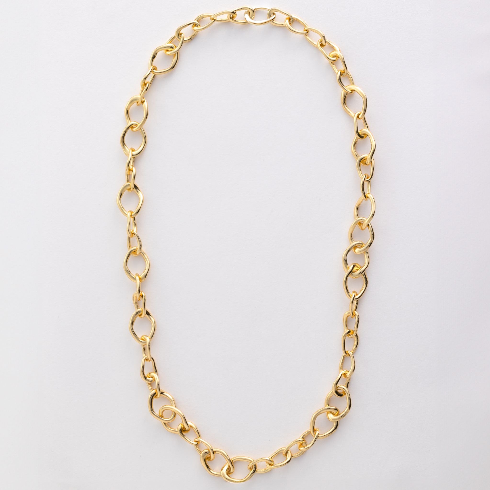 Chain features a handcut natural ripple shape and is crafted from sterling silver or 18ct gold vermeil.