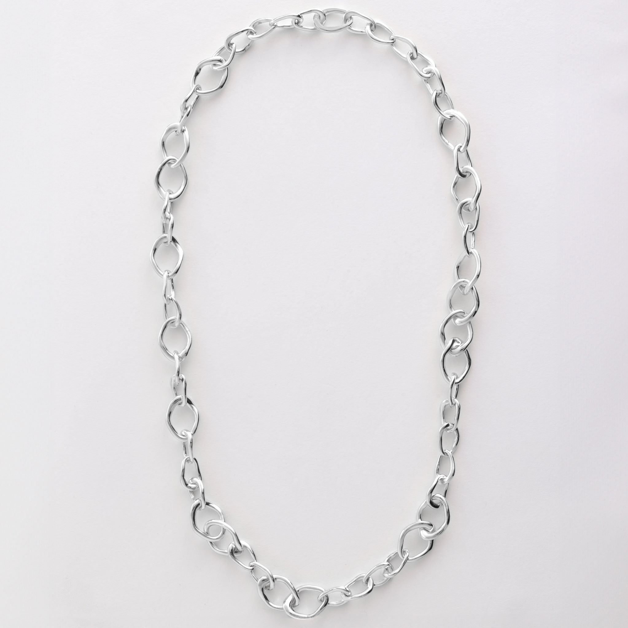 Chain features a handcut natural ripple shape and is crafted from sterling silver or 18ct gold vermeil.